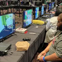 Gamers lost in play in the gaming room.