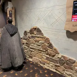Stucco and stone add to the African theming in the convention center.