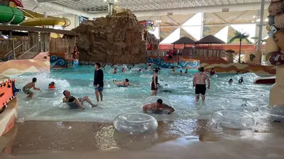 People play in the indoor waterpark.