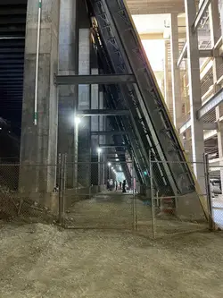 A cave-like space behind the angled wall