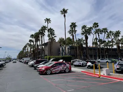 Itasha cars have a dedicated space near the front of the resort.