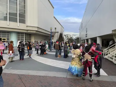 Photographers and cosplayers gather between the convention center and Hyatt.