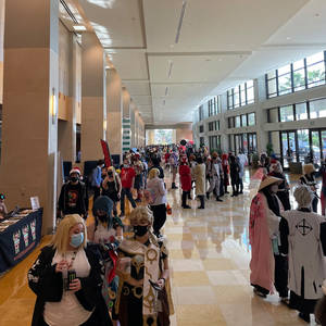 Attendees fill the convention center lobby.