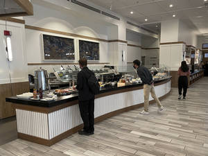 The breakfast buffet features a wide variety of items including made-to-order omelets and prosciutto.