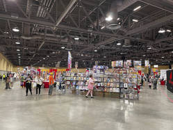 The vendor hall and artist alley filled one large hall.