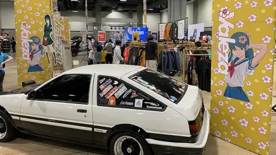 An Initial D Itasha car on display in the dealers room.