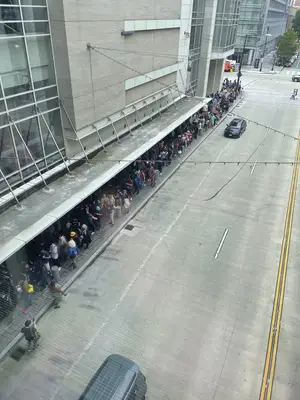 The entrance queue wrapped around the building.