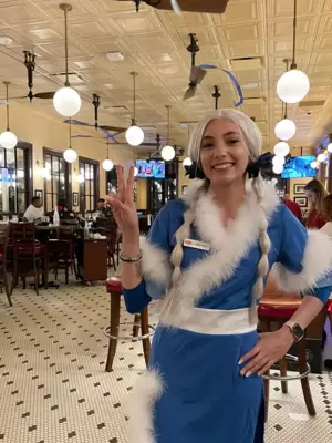 Kalahari employee Cameron is cosplaying as Princess Yue from Avatar The Last Airbender. The entire restaurant was themed.