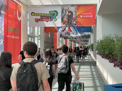 Banners advertising anime and games cover the walls and ceilings.